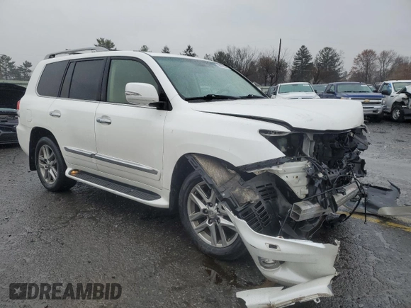 2015 Lexus LX 570 with VIN JTJHY7AXXF4185222, listed as a Copart auction lot 83833874 with 165,154 mi miles and Salvage Title. Bid and sale history available at DreamBid. Image 4.