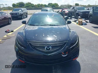 2009 Mazda 6 with VIN 1YVHP80AX95M26374, listed as a IAAI auction lot 42238072 with 158,462 mi miles and . Bid and sale history available at DreamBid. Image 12.