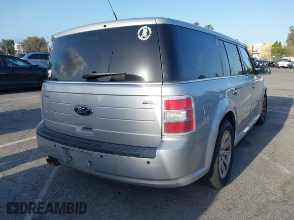 2012 Ford Flex SEL with VIN 2FMGK5CC2CBD16543, listed as a IAAI auction lot 41953622 with 124,941 mi miles. Bid and sale history available at carsss.com. Image 4.