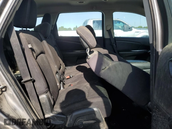 2013 Dodge Journey American Value with VIN 3C4PDCAB8DT590509, listed as a Copart auction lot 57347375 with 203,642 mi miles and Clean title. Bid and sale history available at DreamBid. Image 11.
