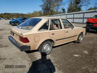 1983 Ford Escort z VIN 2FABP1347DX161788, wystawiony jako Copart lot #76347694 z przebiegiem 58 514 mil mil oraz Szkody całkowita. Historia ofert i sprzedaży dostępna na DreamBid. Obrazek 3.