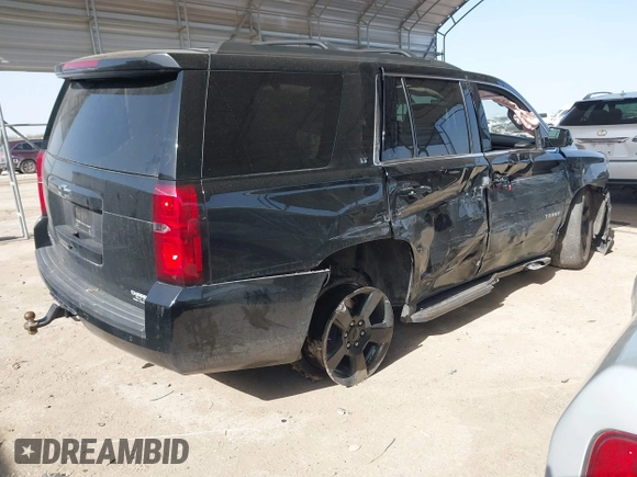 2019 Chevrolet Tahoe LT z VIN 1GNSCBKC0KR328639, wystawiony jako IAAI lot #41740284 z przebiegiem 111 734 mil mil oraz . Historia ofert i sprzedaży dostępna na DreamBid. Obrazek 4.