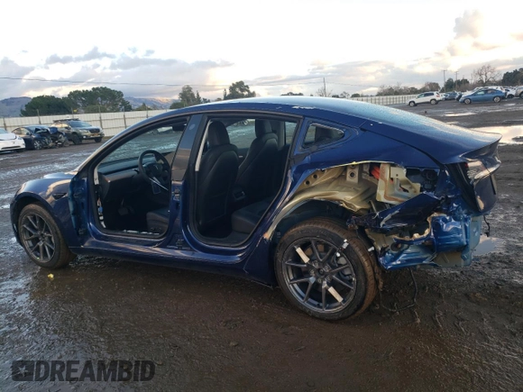 2022 Tesla Model 3 Long Range with VIN 5YJ3E1EB0NF147376, listed as a Copart auction lot 87017294 with 23,149 mi miles and Salvage Title. Bid and sale history available at carsss.com. Image 2.