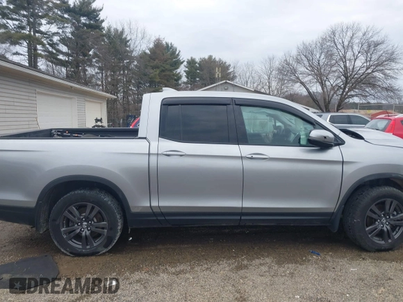 2020 Honda Ridgeline Sport with VIN 5FPYK3F13LB023123, listed as a IAAI auction lot 41694273 with 51,934 mi miles and . Bid and sale history available at DreamBid. Image 14.