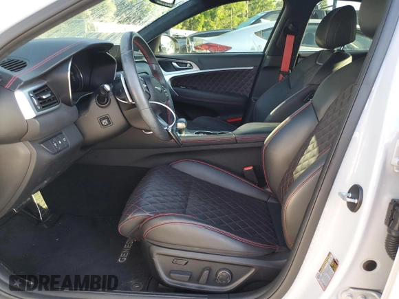 2023 Genesis G70 3.3T with VIN KMTG54TE3PU113251, listed as a Copart auction lot 52675895 with 20,969 mi miles and Salvage title. Bid and sale history available at DreamBid. Image 7.