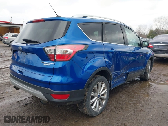2017 Ford Escape Titanium with VIN 1FMCU9JD8HUA59000, listed as a IAAI auction lot 41559788 with 90,319 mi miles. Bid and sale history available at carsss.com. Image 4.