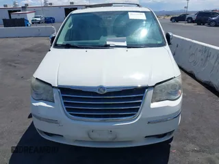 2010 Chrysler Town & Country Limited with VIN 2A4RR7DX1AR357668, listed as a IAAI auction lot 42173545 with 114,486 mi miles and . Bid and sale history available at carsss.com. Image 6.