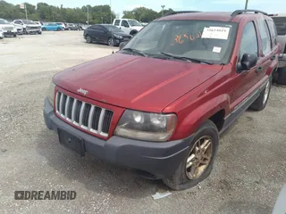 2004 Jeep Grand Cherokee Laredo with VIN 1J4GW48SX4C160475, listed as a IAAI auction lot 36500183 with 189,047 mi miles and . Bid and sale history available at DreamBid. Image 2.