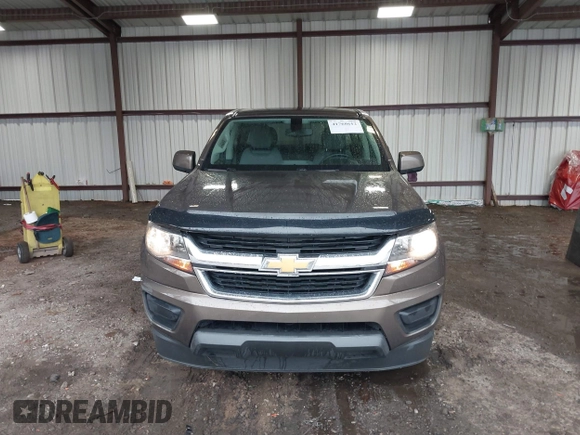 2015 Chevrolet Colorado 2WD WT z VIN 1GCGSAE34F1270479, wystawiony jako IAAI lot #41768612 z przebiegiem 158 984 mil mil oraz . Historia ofert i sprzedaży dostępna na DreamBid. Obrazek 12.