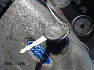 2009 Ford Focus SE z VIN 1FAHP35N79W166875, wystawiony jako IAAI lot #41506700 z przebiegiem 174 061 mil mil oraz . Historia ofert i sprzedaży dostępna na DreamBid. Obrazek 11.