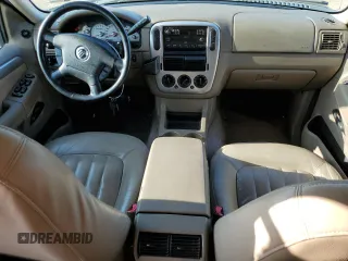 2004 Mercury Mountaineer z VIN 4M2ZU66K74UJ15419, wystawiony jako Copart lot #68126214 z przebiegiem 190 460 mil mil oraz Tytuł czysty. Historia ofert i sprzedaży dostępna na DreamBid. Obrazek 8.
