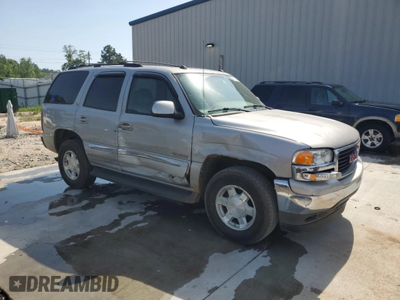 2005 GMC Yukon SLE z VIN 1GKEC13T75J179930, wystawiony jako Copart lot #57259205 z przebiegiem 310 454 mil mil oraz Szkoda całkowita • Salvage title. Historia ofert i sprzedaży dostępna na DreamBid. Obrazek 4.
