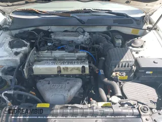 2005 Hyundai Sonata GL with VIN KMHWF25S65A131588, listed as a IAAI auction lot 41934026 with 129,886 mi miles. Bid and sale history available at carsss.com. Image 10.