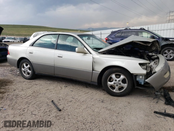 1999 Lexus ES 300 z VIN JT8BF28G3X5063996, wystawiony jako Copart lot #54093095 z przebiegiem 216 576 mil mil oraz Szkoda całkowita • Salvage title. Historia ofert i sprzedaży dostępna na DreamBid. Obrazek 4.