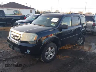 2009 Honda Pilot EX-L with VIN 5FNYF48659B012032, listed as a IAAI auction lot 41801232 with 205,636 mi miles and . Bid and sale history available at carsss.com. Image 17.