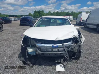 2011 Ford Fusion Hybrid with VIN 3FADP0L37BR264635, listed as a IAAI auction lot 42204672 with 147,326 mi miles and . Bid and sale history available at DreamBid. Image 13.