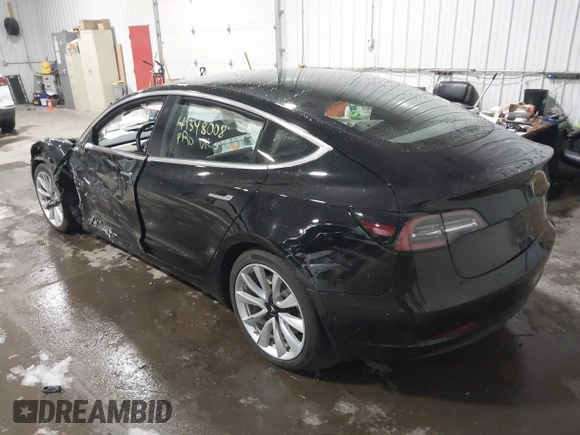 2018 Tesla Model 3 Long Range Battery with VIN 5YJ3E1EB7JF086778, listed as a IAAI auction lot 41348008 with 74,491 mi miles and . Bid and sale history available at DreamBid. Image 3.