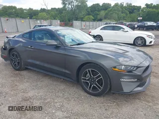 2020 Ford Mustang EcoBoost with VIN 1FA6P8THXL5142584, listed as a IAAI auction lot 42338058 with 83,633 mi miles and . Bid and sale history available at DreamBid. Image 1.