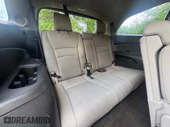 2018 Honda Pilot Touring z VIN 5FNYF6H94JB070661, wystawiony jako Copart lot #60926415 z przebiegiem 205 538 mil mil oraz Czysty tytuł • Clean title. Historia ofert i sprzedaży dostępna na DreamBid. Obrazek 12.