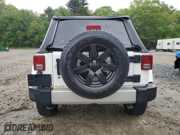 2013 Jeep Wrangler Unlimited Sahara with VIN 1C4HJWEG4DL562951, listed as a Copart auction lot 58001475 with 95,744 mi miles and Clean title. Bid and sale history available at DreamBid. Image 6.