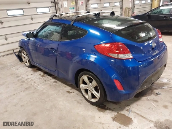 2014 Hyundai Veloster with VIN KMHTC6AD4EU196870, listed as a IAAI auction lot 41207663 with 119,252 mi miles. Bid and sale history available at carsss.com. Image 3.