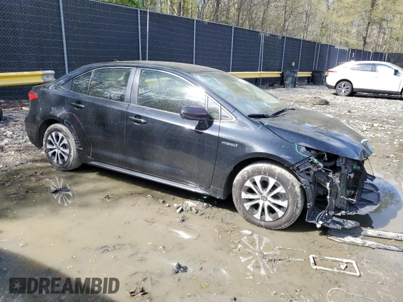 2021 Toyota Corolla Hybrid LE with VIN JTDEAMDE1MJ002887, listed as a Copart auction lot 53092595 with 65,547 mi miles and Salvage Title. Bid and sale history available at carsss.com. Image 4.