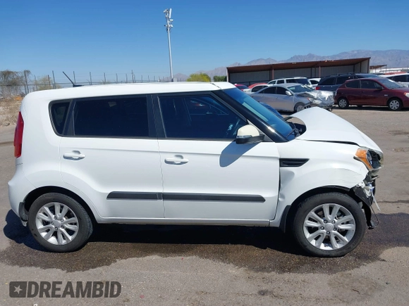 2012 Kia Soul + with VIN KNDJT2A60C7479185, listed as a IAAI auction lot 41885776 with 72,719 mi miles. Bid and sale history available at carsss.com. Image 14.