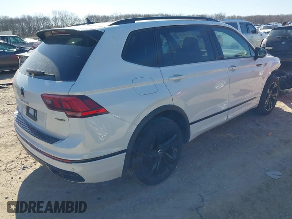 2024 Volkswagen Tiguan SE R-Line Black with VIN 3VV8B7AX3RM052588, listed as a IAAI auction lot 41876448 with 22,835 mi miles and . Bid and sale history available at DreamBid. Image 4.