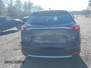 2019 Mazda CX-9 Grand Touring with VIN JM3TCBDY3K0307964, listed as a IAAI auction lot 41706594 with 170,596 mi miles and . Bid and sale history available at DreamBid. Image 16.