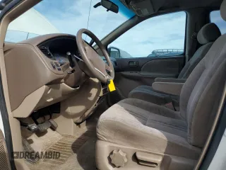 2001 Toyota Sienna LE with VIN 4T3ZF13C61U362980, listed as a Copart auction lot 71986484 with 188,556 mi miles and Salvage Title. Bid and sale history available at carsss.com. Image 7.