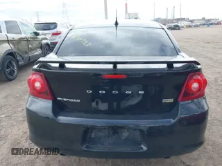 2013 Dodge Avenger SXT with VIN 1C3CDZCG5DN741112, listed as a IAAI auction lot 41838733 with 179,000 mi miles and . Bid and sale history available at carsss.com. Image 16.