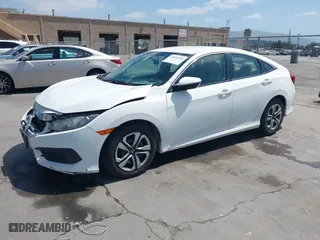 2016 Honda Civic Sedan LX with VIN 19XFC2F54GE215012, listed as a IAAI auction lot 42046334 with 146,348 mi miles. Bid and sale history available at carsss.com. Image 17.