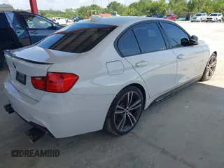 2015 BMW 3 Series 335i with VIN WBA3A9C57FK472521, listed as a IAAI auction lot 42672174 with Not provided miles and . Bid and sale history available at DreamBid. Image 4.