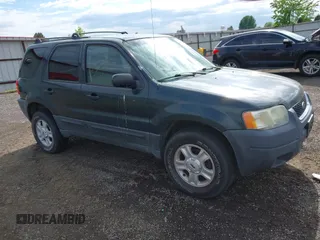 2003 Ford Escape XLT Popular 2 with VIN 1FMYU93103KC64436, listed as a IAAI auction lot 42254305 with 244,818 mi miles and . Bid and sale history available at DreamBid. Image 1.