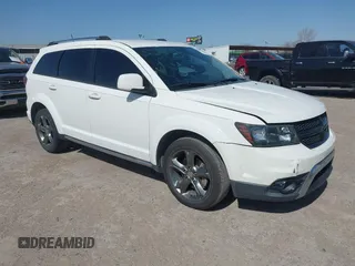 2016 Dodge Journey Crossroad Plus z VIN 3C4PDCGB1GT123363, wystawiony jako IAAI lot #41857436 z przebiegiem 134 769 mil mil oraz . Historia ofert i sprzedaży dostępna na DreamBid. Obrazek 1.