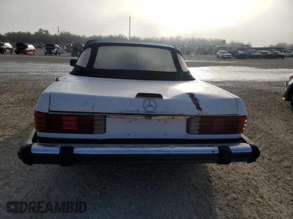 1980 Mercedes-Benz SL with VIN 10704412062529, listed as a Copart auction lot 77941784 with Not provided miles and Salvage title. Bid and sale history available at DreamBid. Image 6.