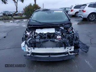 2022 Toyota Prius L Eco with VIN JTDKAMFU9N3180267, listed as a Copart auction lot 84765134 with 0 mi miles and Salvage Title. Bid and sale history available at carsss.com. Image 5.