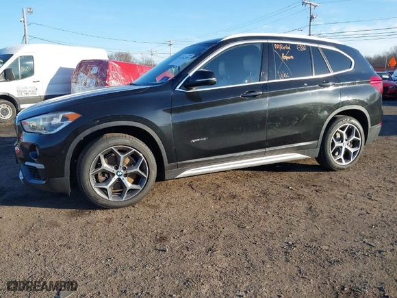 2017 BMW X1 xDrive28i with VIN WBXHT3Z33H4A65699, listed as a IAAI auction lot 41752257 with 66,306 mi miles. Bid and sale history available at carsss.com. Image 17.