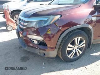 2016 Honda Pilot EX-L with VIN 5FNYF5H58GB026209, listed as a IAAI auction lot 41333088 with 129,484 mi miles and . Bid and sale history available at DreamBid. Image 17.