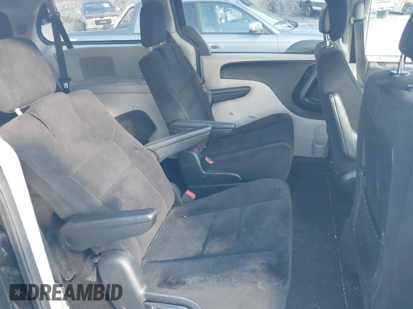 2014 Dodge Grand Caravan SXT with VIN 2C4RDGCG4ER337202, listed as a IAAI auction lot 40781755 with 258,524 mi miles and . Bid and sale history available at DreamBid. Image 8.