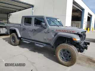 2023 Jeep Gladiator Mojave z VIN 1C6JJTEG7PL548084, wystawiony jako Copart lot #52827265 z przebiegiem 26 789 mil mil oraz Czysty tytuł • Clean title. Historia ofert i sprzedaży dostępna na DreamBid. Obrazek 4.