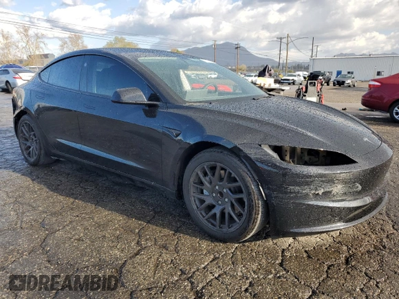 2024 Tesla Model 3 with VIN 5YJ3E1EA5RF738574, listed as a Copart auction lot 48425325 with 9,423 mi miles and Salvage Title. Bid and sale history available at DreamBid. Image 4.