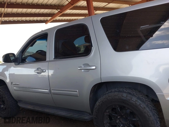 2011 Chevrolet Tahoe LS with VIN 1GNSCAE02BR181767, listed as a IAAI auction lot 42078569 with 212,857 mi miles and . Bid and sale history available at DreamBid. Image 14.