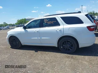 2023 Dodge Durango R/T Plus with VIN 1C4SDJCTXPC553725, listed as a IAAI auction lot 42290693 with 74,995 mi miles and . Bid and sale history available at DreamBid. Image 14.