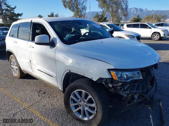 2021 Jeep Grand Cherokee Laredo X with VIN 1C4RJEAG2MC719395, listed as a IAAI auction lot 41338484 with 99,636 mi miles. Bid and sale history available at carsss.com. Image 1.
