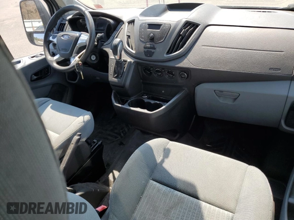 2015 Ford Transit Cargo with VIN 1FTNR1ZM5FKA66614, listed as a Copart auction lot 70069244 with 52,690 mi miles and Salvage Title. Bid and sale history available at DreamBid. Image 8.