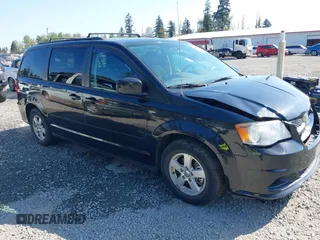 2012 Dodge Grand Caravan SXT with VIN 2C4RDGCG2CR319651, listed as a IAAI auction lot 42097594 with 155,521 mi miles and . Bid and sale history available at DreamBid. Image 1.