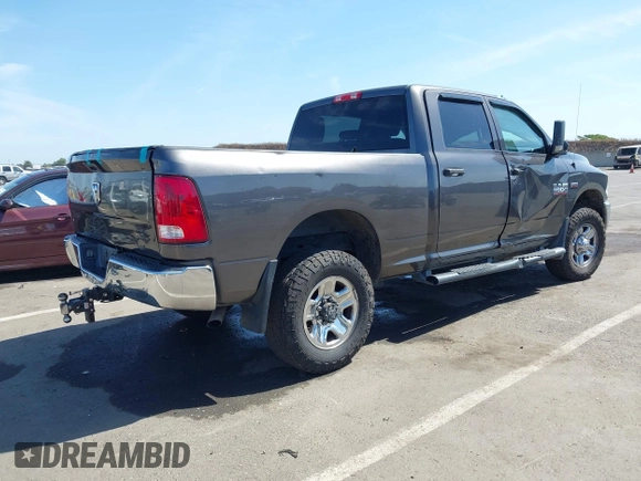 2015 Ram 2500 Tradesman z VIN 3C6TR5CT5FG528294, wystawiony jako IAAI lot #42374966 z przebiegiem Nie podano mil oraz . Historia ofert i sprzedaży dostępna na DreamBid. Obrazek 4.