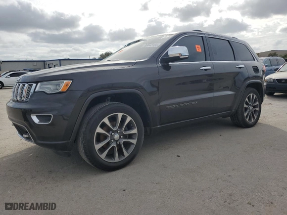 2017 Jeep Grand Cherokee Overland with VIN 1C4RJECG1HC652145, listed as a Copart auction lot 80042104 with 192,145 mi miles and Clean Title. Bid and sale history available at carsss.com. Image 1.