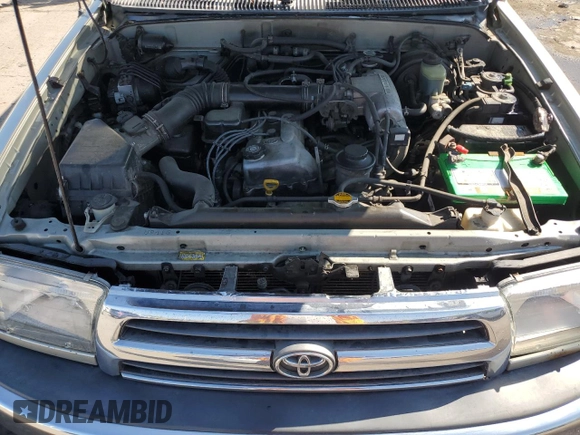 1999 Toyota 4Runner z VIN JT3HM84R7X0035003, wystawiony jako Copart lot #60071745 z przebiegiem 266 385 mil mil oraz Szkoda całkowita • Salvage title. Historia ofert i sprzedaży dostępna na DreamBid. Obrazek 12.